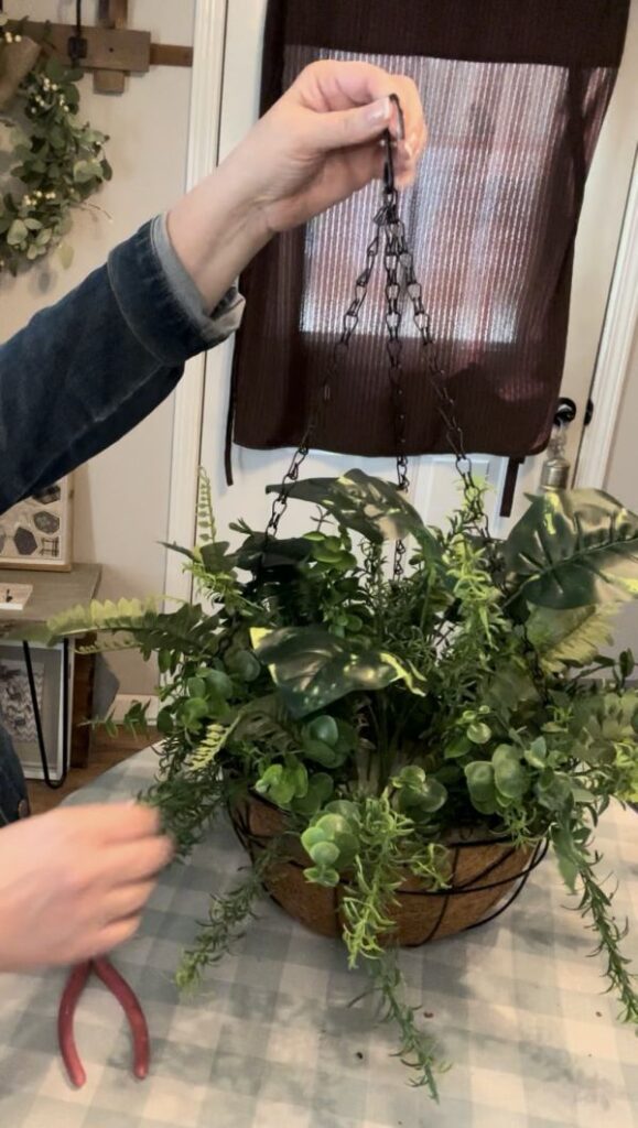 hanging basket of faux greenery from Dollar Tree