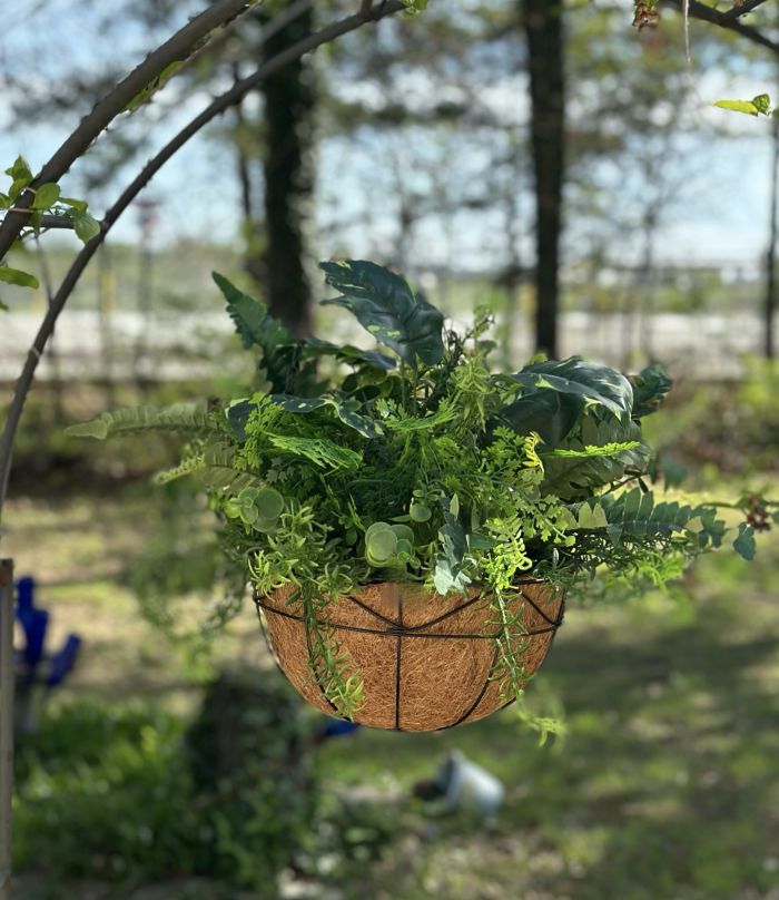 hanging basket of faux greenery from Dollar Tree